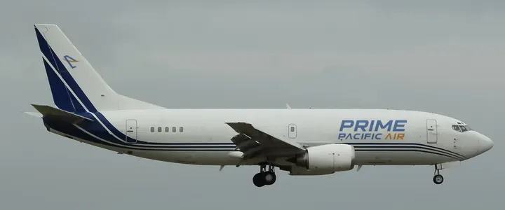 Stock photo of a Boeing 737-300 freighter with our logo added, not our plane